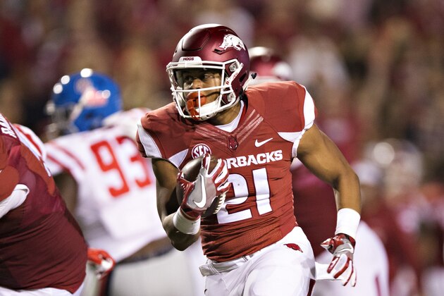 FAYETTEVILLE, AR - OCTOBER15:  Devwah Whaley #21 of the Arkansas Razorbacks runs with the ball during a game against the Mississippi Rebels at Razorback Stadium on October 15, 2016 in Fayetteville, Arkansas.  (Photo by Wesley Hitt/Getty Images)