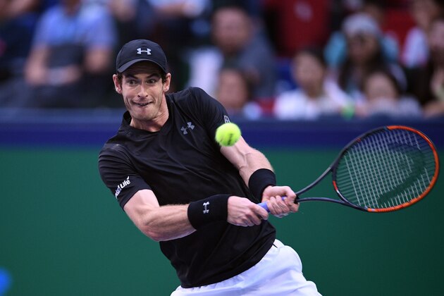 Andy Murray of Britain hits a return against Roberto Bautista Agut of Spain in their men's singles finals match at the Shanghai Masters tennis tournament in Shanghai on October 16, 2016. / AFP / JOHANNES EISELE        (Photo credit should read JOHANNES EISELE/AFP/Getty Images)