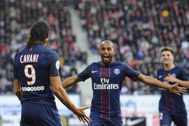 Paris Saint-Germain's Uruguayan forward Edinson Cavani (L) celebrates after scoring a goal during the French L1 football match between Nancy (ASNL) and Paris (PSG) on October 15, 2016, at Marcel Picot stadium in Tomblaine, eastern France. / AFP / JEAN-CHRISTOPHE VERHAEGEN        (Photo credit should read JEAN-CHRISTOPHE VERHAEGEN/AFP/Getty Images)