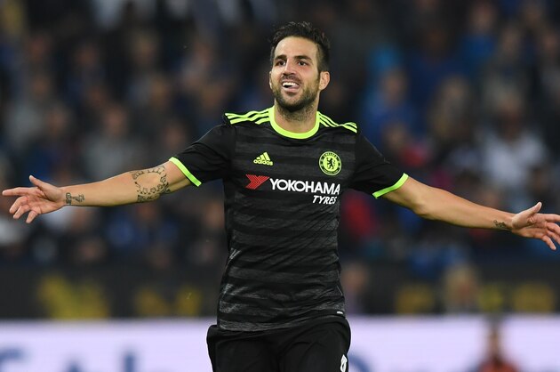 Chelsea's Spanish midfielder Cesc Fabregas celebrates scoring their fourth goal during extra-time in the English League Cup third round football match between Leicester City and Chelsea at King Power Stadium in Leicester, central England on September 20, 2016. / AFP / Anthony DEVLIN / RESTRICTED TO EDITORIAL USE. No use with unauthorized audio, video, data, fixture lists, club/league logos or 'live' services. Online in-match use limited to 75 images, no video emulation. No use in betting, games or single club/league/player publications.  /         (Photo credit should read ANTHONY DEVLIN/AFP/Getty Images)