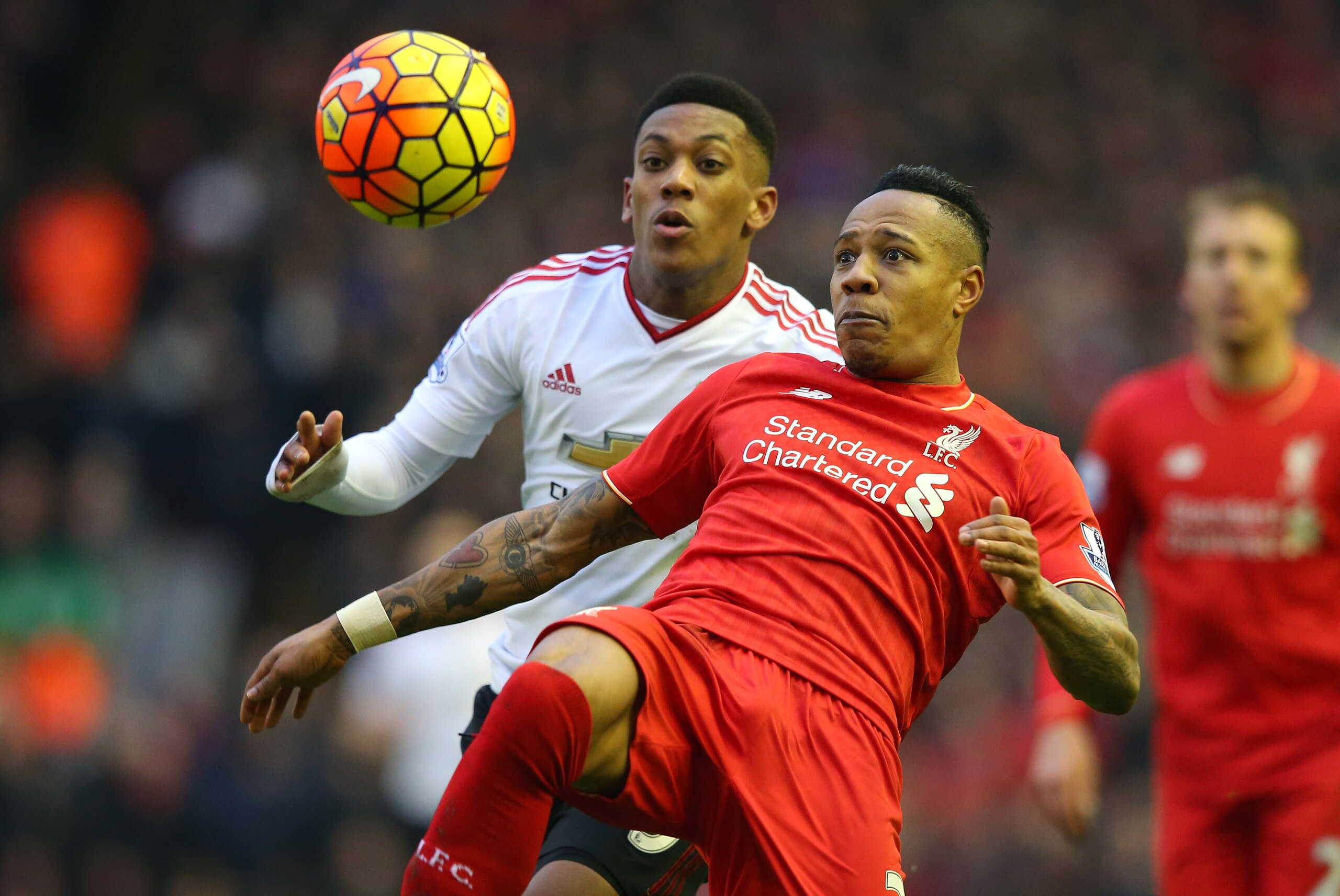 LIVERPOOL, ENGLAND - JANUARY 17:  Nathaniel Clyne of Liverpool clears the ball during the Barclays Premier League match between Liverpool and Manchester United at Anfield on January 17, 2016 in Liverpool, England.  (Photo by Alex Livesey/Getty Images)