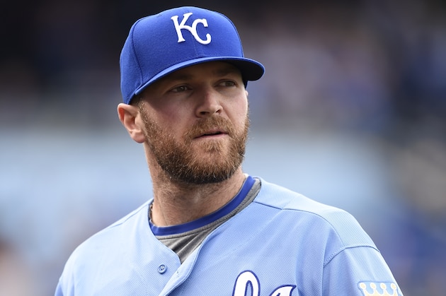 KANSAS CITY, MO - APRIL 10:  Pitcher Wade Davis #17 of the Kansas City Royals looks up at the crowd as he walks off the field after the third out of the inning in the game against the Minnesota Twins on April 10, 2016 at Kauffman Stadium in Kansas City, Missouri. The Kansas City Royals defeated the Minnesota Twins 4-3 in 10 innings. (Photo by John Williamson/MLB Photos via Getty Images)