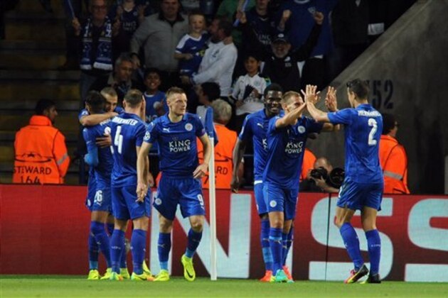 Leicester's players celebrate the opening goal of their team during the Champions League Group G soccer match between Leicester City and FC Porto at King Power Stadium, Leicester, England, Tuesday, Sept. 27, 2016. (AP Photo/Rui Vieira)