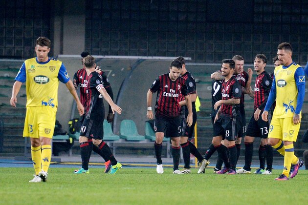 VERONA, ITALY - OCTOBER 16:  Juraj Kucka of AC Milan is mobbed by team mates after scoring his team's first goal during the Serie A match between AC ChievoVerona and AC Milan at Stadio Marc'Antonio Bentegodi on October 16, 2016 in Verona, Italy.  (Photo by Dino Panato/Getty Images)