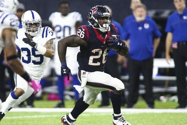 Oct 16, 2016; Houston, TX, USA; Houston Texans running back Lamar Miller (26) runs with the ball during the fourth quarter against the Indianapolis Colts at NRG Stadium. The Texans won 26-23 in overtime. Mandatory Credit: Troy Taormina-USA TODAY Sports