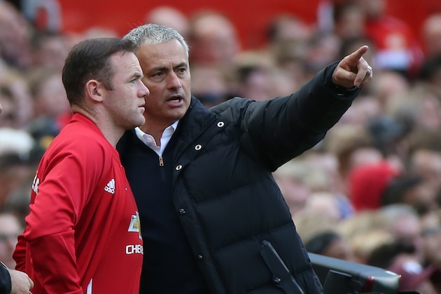 Manchester United's Portuguese manager Jose Mourinho (R) gives instructions to Manchester United's English striker Wayne Rooney as he comes on as a substitute during the English Premier League football match between Manchester United and Stoke City at Old Trafford in Manchester, north west England, on October 2, 2016. / AFP / Scott Heppell / RESTRICTED TO EDITORIAL USE. No use with unauthorized audio, video, data, fixture lists, club/league logos or 'live' services. Online in-match use limited to 75 images, no video emulation. No use in betting, games or single club/league/player publications.  /         (Photo credit should read SCOTT HEPPELL/AFP/Getty Images)