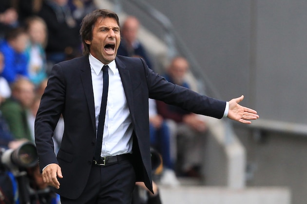 Chelsea's Italian head coach Antonio Conte gestures on the touchline during the English Premier League football match between Hull City and Chelsea at the KCOM Stadium in Kingston upon Hull, north east England on October 1, 2016.
Chelsea won the game 2-0. / AFP / Lindsey PARNABY / RESTRICTED TO EDITORIAL USE. No use with unauthorized audio, video, data, fixture lists, club/league logos or 'live' services. Online in-match use limited to 75 images, no video emulation. No use in betting, games or single club/league/player publications.  /         (Photo credit should read LINDSEY PARNABY/AFP/Getty Images)