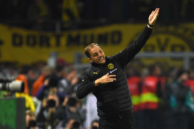 Dortmund's head coach Thomas Tuchel reacts during the German first division Bundesliga football match between BVB Borussia Dortmund and Hertha BSC Berlin in Dortmund, western Germany on October 14, 2016. / AFP / PATRIK STOLLARZ / RESTRICTIONS: DURING MATCH TIME: DFL RULES TO LIMIT THE ONLINE USAGE TO 15 PICTURES PER MATCH AND FORBID IMAGE SEQUENCES TO SIMULATE VIDEO. == RESTRICTED TO EDITORIAL USE == FOR FURTHER QUERIES PLEASE CONTACT DFL DIRECTLY AT + 49 69 650050
        (Photo credit should read PATRIK STOLLARZ/AFP/Getty Images)