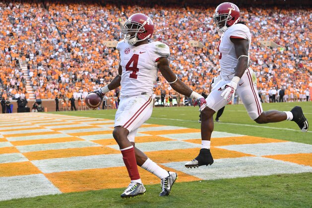 Oct 15, 2016; Knoxville, TN, USA;  Alabama Crimson Tide defensive back Eddie Jackson (4) celebrates his punt return for a 79yd touchdown against the Tennessee Volunteers during the fourth quarter at Neyland Stadium. Mandatory Credit: John David Mercer-USA TODAY Sports