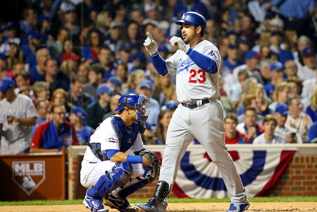 Oct 16, 2016; Chicago, IL, USA; Los Angeles Dodgers first baseman Adrian Gonzalez (23) celebrates after hitting a solo home run during the second inning against the Chicago Cubs in game two of the 2016 NLCS playoff baseball series at Wrigley Field. Mandatory Credit: Jerry Lai-USA TODAY Sports
