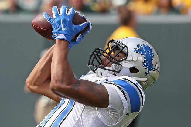 GREEN BAY, WI - SEPTEMBER 25: Marvin Jones #11 of the Detroit Lions catches a touchdown pass against the Green Bay Packers at Lambeau Field on September 25, 2016 in Green Bay, Wisconsin. The Packers defeated the Lions 34-27. (Photo by Jonathan Daniel/Getty Images)