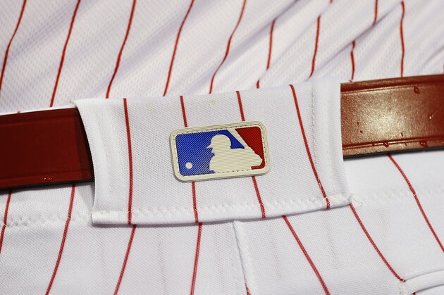 PHILADELPHIA, PA - APRIL 15: The MLB logo is seen on the belt loop of a Philadelphia Phillies player during a game against the Washington Nationals at Citizens Bank Park on April 15, 2016 in Philadelphia, Pennsylvania.(Photo by Rich Schultz/Getty Images)
