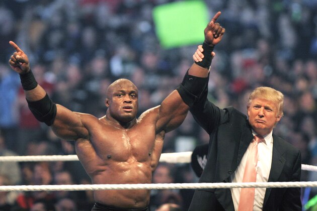 DETROIT - APRIL 1: Donald Trump raises the hand of WWE wrestler Bobby Lashley in victory after Lashley defeated Umaga in the Battle of the Billionaires at the 2007 World Wrestling Entertainment's Wrestlemania April 1, 2007 at Ford Field in Detroit, Michigan. (Photo by Bill Pugliano/Getty Images)