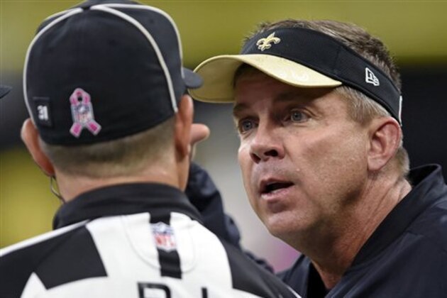 New Orleans Saints head coach Sean Payton argues with the officials on a pass interference call in the second half of an NFL football game against the Carolina Panthers in New Orleans, Sunday, Oct. 16, 2016. (AP Photo/Bill Feig)