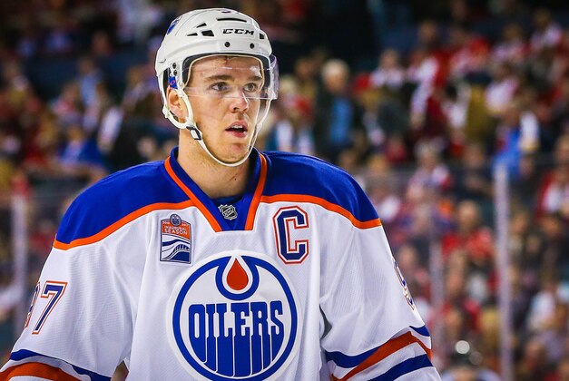 Oct 14, 2016; Calgary, Alberta, CAN; Edmonton Oilers center Connor McDavid (97) during the face off against Calgary Flames during the second period at Scotiabank Saddledome. Mandatory Credit: Sergei Belski-USA TODAY Sports