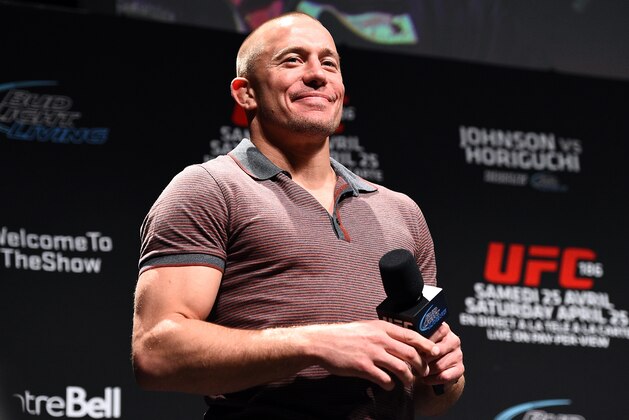 MONTREAL, QC - APRIL 24:  Former UFC welterweight champion Georges St-Pierre interacts with fans during a Q&A session before the UFC 186 weigh-in event at Metropolis on April 24, 2015 in Montreal, Quebec, Canada. (Photo by Jeff Bottari/Zuffa LLC/Zuffa LLC via Getty Images)