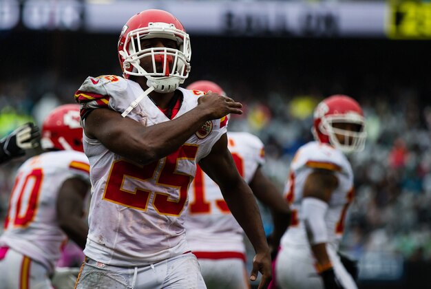 Oct 16, 2016; Oakland, CA, USA; Kansas City Chiefs running back Jamaal Charles (25) celebrates scoring a touchdown against the Oakland Raiders during the second quarter at Oakland Coliseum. Mandatory Credit: Kelley L Cox-USA TODAY Sports