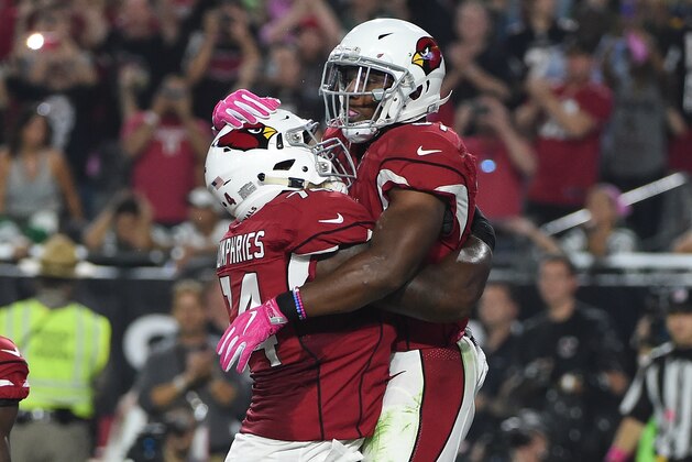 GLENDALE, AZ - OCTOBER 17:  Running back David Johnson #31 of the Arizona Cardinals celebrates with offensive tackle D.J. Humphries #74 after rushing the football two yards for a touchdown in the second quarter against the New York Jets at University of Phoenix Stadium on October 17, 2016 in Glendale, Arizona.  (Photo by Norm Hall/Getty Images)