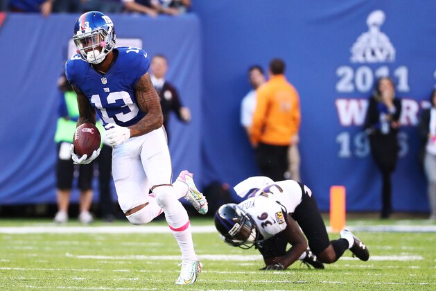 EAST RUTHERFORD, NJ - OCTOBER 16:  Odell Beckham #13 of the New York Giants scores the go ahead touchdown against  Tavon Young #36 of the Baltimore Ravens  in the fourth quarter with the Giants winning 27-23 during their game at MetLife Stadium on October 16, 2016 in East Rutherford, New Jersey.  (Photo by Al Bello/Getty Images)