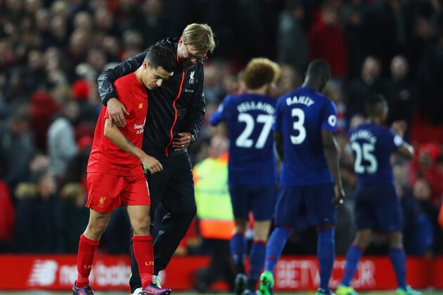 LIVERPOOL, ENGLAND - OCTOBER 17:  Jurgen Klopp, Manager of Liverpool talks with Philippe Coutinho of Liverpool after the Premier League match between Liverpool and Manchester United at Anfield on October 17, 2016 in Liverpool, England.  (Photo by Clive Brunskill/Getty Images)