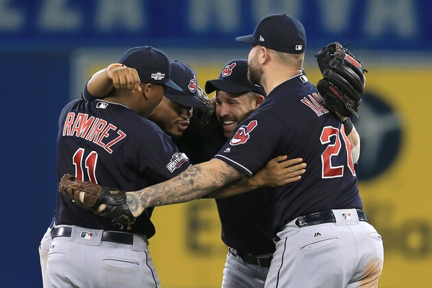 TORONTO, ON - OCTOBER 17:  Jose Ramirez #11, Francisco Lindor #12, Jason Kipnis #22 and Mike Napoli #26 of the Cleveland Indians celebrate after defeating the Toronto Blue Jays with a score of 4 to 2 in game three of the American League Championship Series at Rogers Centre on October 17, 2016 in Toronto, Canada.  (Photo by Vaughn Ridley/Getty Images)
