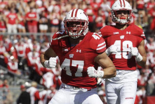 FILE - In this Sept. 17, 2016, file photo,k Wisconsin's Vince Biegel (47) celebrates after breaking up a third down play during the first half of an NCAA college football game against Georgia State, in Madison, Wis. Wisconsin’s defense could soon be getting an energy boost. Outside linebacker Vince Biegel is listed as questionable on the injury report to start practice this week ahead of the 10th-ranked Badgers’ important road game on Saturday at Iowa. It’s a big step forward for Biegel, who has missed the last two games with a right foot injury. (AP Photo/Morry Gash, File)