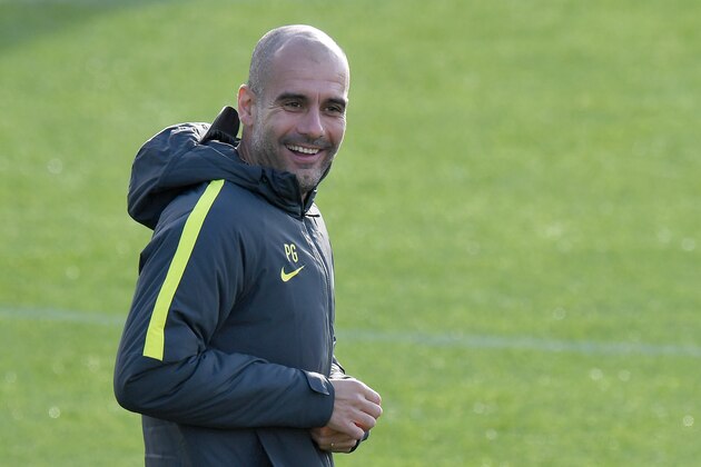 Manchester City's Spanish manager Pep Guardiola attends a team training session at Manchester City Football Academy Campus in Manchester, north west England, on October 18, 2016 ahead of their UEFA Champions League Group C football match against Barcelona at the Camp Nou on October 19.  / AFP / Anthony Devlin        (Photo credit should read ANTHONY DEVLIN/AFP/Getty Images)