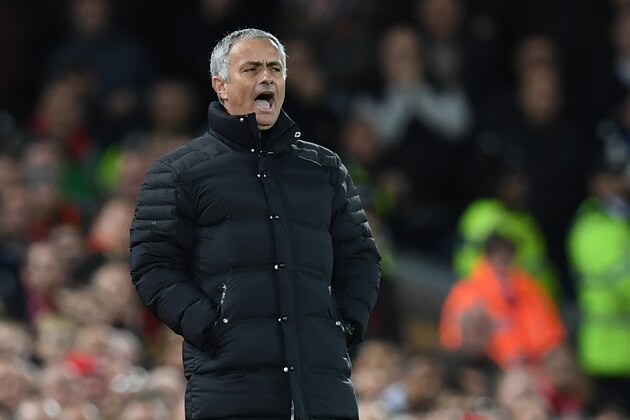 Manchester United's Portuguese manager Jose Mourinho gestures during the English Premier League football match between Liverpool and Manchester United at Anfield in Liverpool, north west England on October 17, 2016. / AFP / Paul ELLIS / RESTRICTED TO EDITORIAL USE. No use with unauthorized audio, video, data, fixture lists, club/league logos or 'live' services. Online in-match use limited to 75 images, no video emulation. No use in betting, games or single club/league/player publications.  /         (Photo credit should read PAUL ELLIS/AFP/Getty Images)