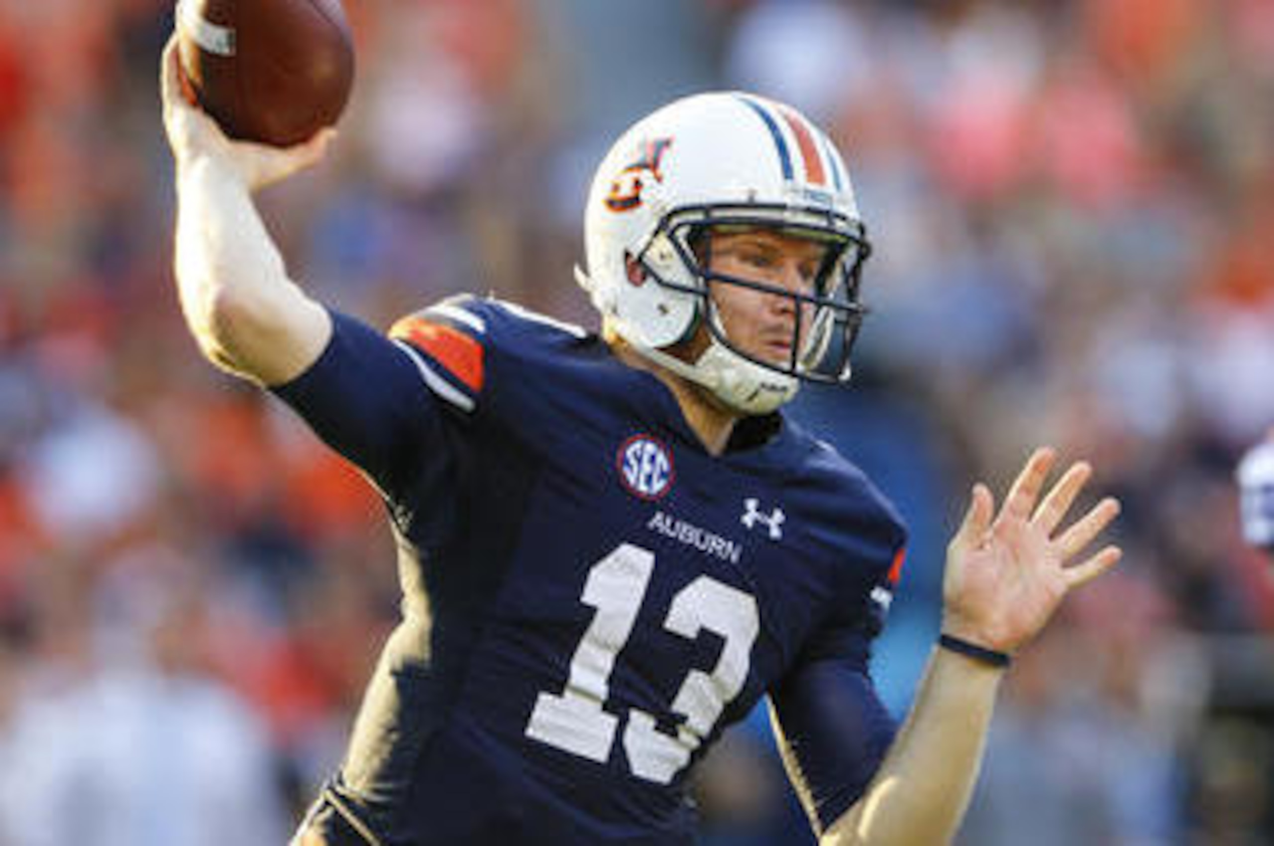 FILE - In this Sept. 24, 2016, file photo, Auburn quarterback Sean White (13) throws a pass against LSU during the first half of an NCAA college football game, in Auburn, Ala. The 21st-ranked Auburn Tigers have definitely shown signs of improvement in recent weeks, but Saturday's game with No. 17 Arkansas will give a better gauge of where they stand. (AP Photo/Butch Dill, File)