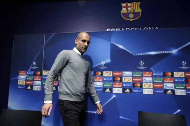 Manchester City's coach Pep Guardiola arrives for a press conference at the Camp Nou stadium in Barcelona, Spain, Tuesday, Oct. 18, 2016. FC Barcelona will play against Manchester City in a Champions League Group C soccer match on Wednesday. (AP Photo/Manu Fernandez)