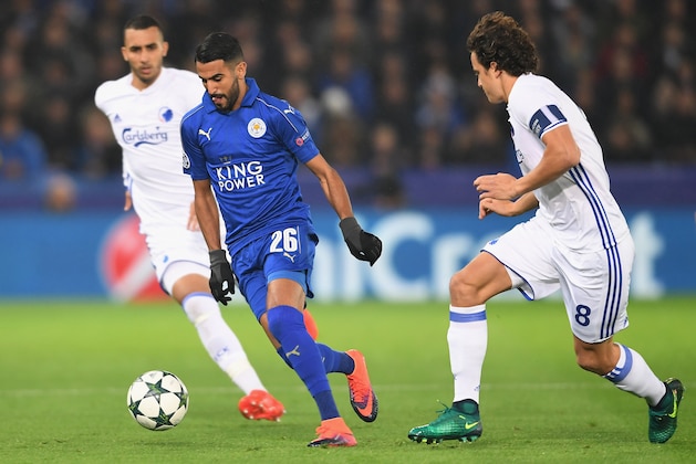 LEICESTER, ENGLAND - OCTOBER 18: Riyad Mahrez of Leicester City and Thomas Delaney of FC Copenhagen compete for the ball during the UEFA Champions League Group G match between Leicester City FC and FC Copenhagen at The King Power Stadium on October 18, 2016 in Leicester, England.  (Photo by Ross Kinnaird/Getty Images)