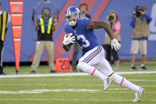 New York Giants wide receiver Odell Beckham (13) runs for a game winning touchdown during the second half of an NFL football game against the Baltimore Ravens Sunday, Oct. 16, 2016, in East Rutherford, N.J. (AP Photo/Bill Kostroun)