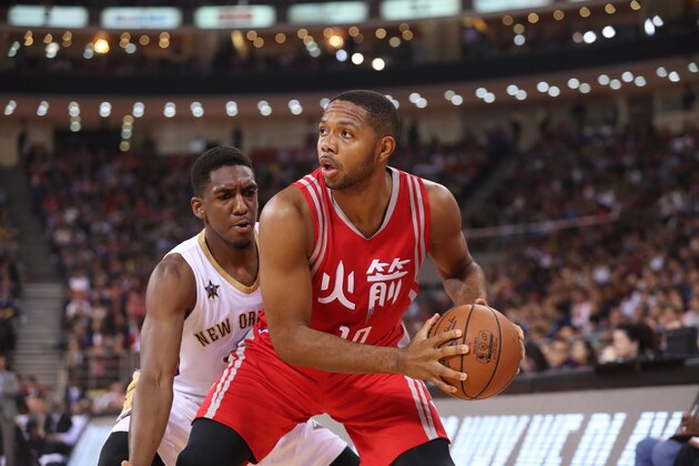BEIJING, CHINA - OCTOBER 12: Eric Gordon #10 of the Houston Rockets looks to pass against Langston Galloway #10 of the New Orleans Pelicans as part of the 2016 Global Games - China at LeSports Center on October 12, 2016 in Beijing, China. NOTE TO USER: User expressly acknowledges and agrees that, by downloading and/or using this photograph, user is consenting to the terms and conditions of the Getty Images License Agreement.  Mandatory Copyright Notice: Copyright 2016 NBAE (Photo by Joe Murphy/NBAE via Getty Images)