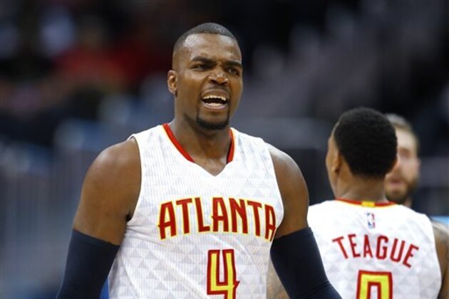 Atlanta Hawks forward Paul Millsap (4) reacts late during the second half of an NBA basketball game against the Miami Heat on Friday, Feb. 19, 2016, in Atlanta. The Heat won 115-111. (AP Photo/Todd Kirkland)