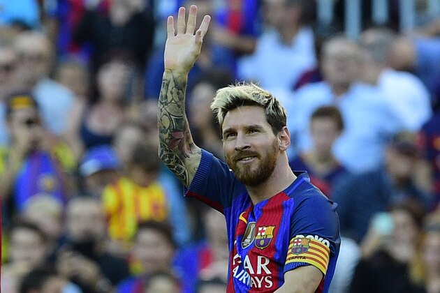 Barcelona's Argentinian forward Lionel Messi celebrates after scoring a goal during the Spanish league football match FC Barcelona vs RC Deportivo de la Coruna at the Camp Nou stadium in Barcelona on October 15, 2016 / AFP / LLUIS GENE        (Photo credit should read LLUIS GENE/AFP/Getty Images)