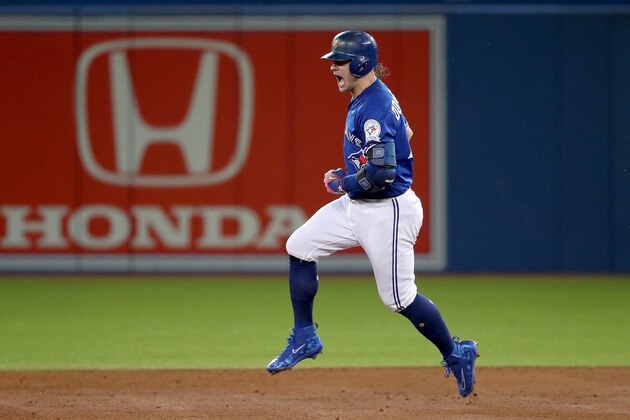TORONTO, ON - OCTOBER 18:  Josh Donaldson #20 of the Toronto Blue Jays celebrates after hitting a solo home run in the third inning against Corey Kluber #28 of the Cleveland Indians during game four of the American League Championship Series at Rogers Centre on October 18, 2016 in Toronto, Canada.  (Photo by Tom Szczerbowski/Getty Images)