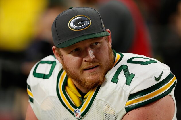 GLENDALE, AZ - DECEMBER 27:  Guard T.J. Lang #70 of the Green Bay Packers on the sidelines during the NFL game against the Arizona Cardinals at the University of Phoenix Stadium on December 27, 2015 in Glendale, Arizona. The Cardinals defeated the Packers 38-8.  (Photo by Christian Petersen/Getty Images)