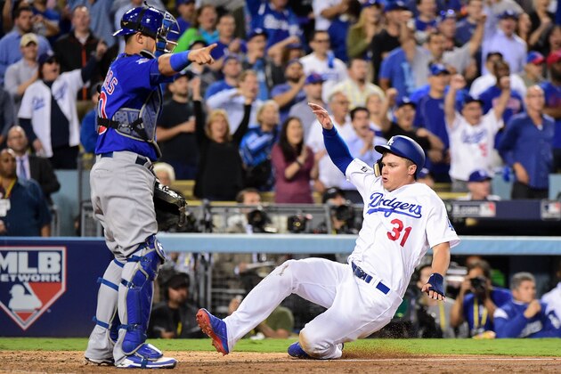 LOS ANGELES, CA - OCTOBER 18:  Joc Pederson #31 of the Los Angeles Dodgers scores against the Chicago Cubs in the eighth inning of game three of the National League Championship Series at Dodger Stadium on October 18, 2016 in Los Angeles, California.  (Photo by Harry How/Getty Images)