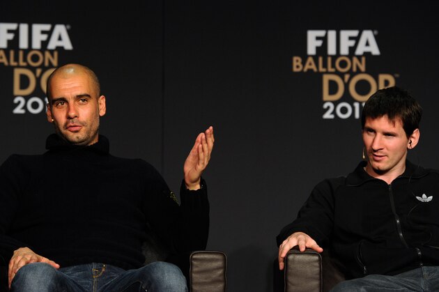 Nominee for the FIFA world coach of the Year for men’s football, Barcelona's Spain coach Pep Guardiola (L), and nominee for the FIFA Ballon d'Or, Barcelona's Argentinian forward Lionel Messi, give a press conference on January 9, 2012 before the FIFA Ballon d'Or ceremony at the Kongresshaus in Zurich. AFP PHOTO / FRANCK FIFE (Photo credit should read FRANCK FIFE/AFP/Getty Images)