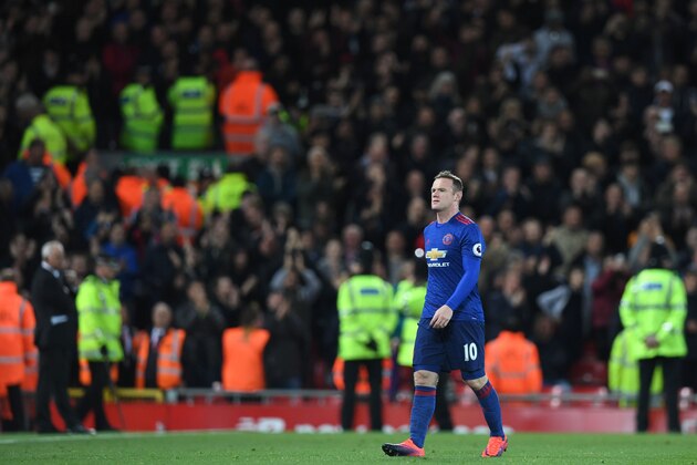 Manchester United's English striker Wayne Rooney walks off after the English Premier League football match between Liverpool and Manchester United at Anfield in Liverpool, north west England on October 17, 2016.
The game finished 0-0. / AFP / Paul ELLIS / RESTRICTED TO EDITORIAL USE. No use with unauthorized audio, video, data, fixture lists, club/league logos or 'live' services. Online in-match use limited to 75 images, no video emulation. No use in betting, games or single club/league/player publications.  /         (Photo credit should read PAUL ELLIS/AFP/Getty Images)