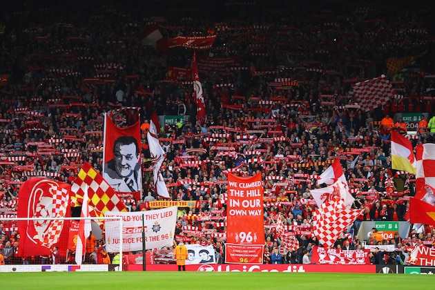 LIVERPOOL, UNITED KINGDOM - MAY 05:  Banners and flags are waved on The Kop prior to the UEFA Europa League semi final second leg match between Liverpool and Villarreal CF at Anfield on May 5, 2016 in Liverpool, England.  (Photo by Richard Heathcote/Getty Images)