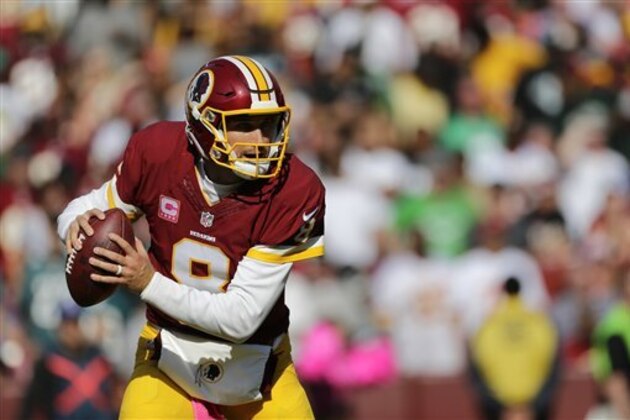 Washington Redskins quarterback Kirk Cousins looks for a receiver in the second half of an NFL football game against the Philadelphia Eagles, Sunday, Oct. 16, 2016, in Landover, Md. (AP Photo/Mark Tenally)