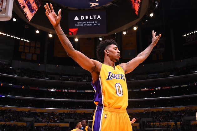 LOS ANGELES, CA - OCTOBER 7: Nick Young #0 of the Los Angeles Lakers plays defense against the Denver Nuggets during a preseason game on October 7, 2016 at STAPLES Center in Los Angeles, California. NOTE TO USER: User expressly acknowledges and agrees that, by downloading and/or using this Photograph, user is consenting to the terms and conditions of the Getty Images License Agreement. Mandatory Copyright Notice: Copyright 2016 NBAE (Photo by Juan Ocampo/NBAE via Getty Images)