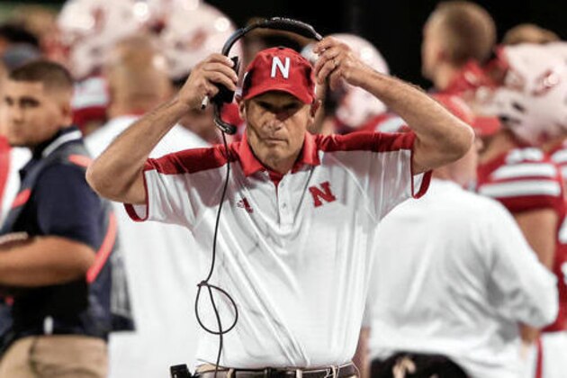 FILE - In this Sept. 3, 2016, file photo,Nebraska head coach Mike Riley puts on his headset during the second half of an NCAA college football game against Fresno State from the sidelines in Lincoln, Neb. The 15th-ranked Cornhuskers, who last week avenged a loss to Northwestern, will host Illinois on Saturday, a team that beat them 14-13 in Champaign last season.  (AP Photo/Nati Harnik, File)