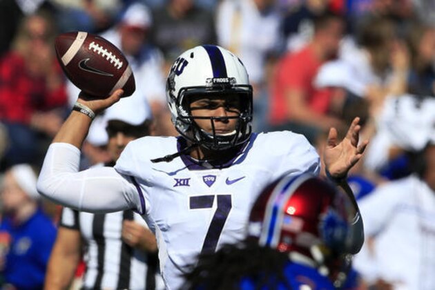 TCU quarterback Kenny Hill passes to a teammate during the first half of an NCAA college football game against Kansas in Lawrence, Kan., Saturday, Oct. 8, 2016. (AP Photo/Orlin Wagner)