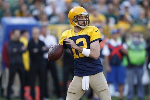 Green Bay Packers' Aaron Rodgers throws during the first half of an NFL football game against the Dallas Cowboys Sunday, Oct. 16, 2016, in Green Bay, Wis. (AP Photo/Matt Ludtke)