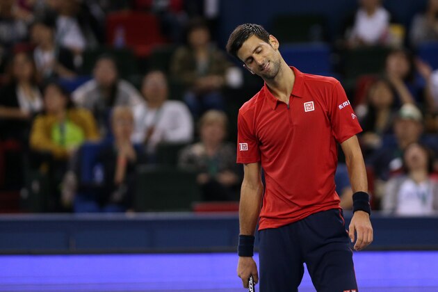 SHANGHAI, CHINA - OCTOBER 15:  Novak Djokovic of Serbia reacts against Roberto Bautista Agut of Spain during the Men's singles semifinal match on day 7 of Shanghai Rolex Masters at Qi Zhong Tennis Centre on October 15, 2016 in Shanghai, China.  (Photo by Zhong Zhi/Getty Images)