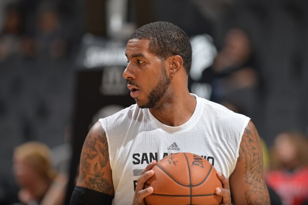 SAN ANTONIO, TX - OCTOBER 8: LaMarcus Aldridge #12 of the San Antonio Spurs warms up before the game against the Atlanta Hawks on October 8, 2016 at the AT&T Center in San Antonio, Texas. NOTE TO USER: User expressly acknowledges and agrees that, by downloading and or using this photograph, user is consenting to the terms and conditions of the Getty Images License Agreement. Mandatory Copyright Notice: Copyright 2016 NBAE (Photos by Mark Sobhani/NBAE via Getty Images)