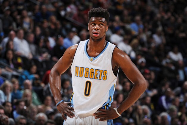 DENVER, CO  - APRIL 2: Emmanuel Mudiay #0 of the Denver Nuggets during the game against the Sacramento Kings  on April 2, 2016 at Pepsi Center in Denver, Colorado. NOTE TO USER: User expressly acknowledges and agrees that, by downloading and or using this Photograph, user is consenting to the terms and conditions of the Getty Images License Agreement. Mandatory Copyright Notice: Copyright 2016 NBAE (Photo by Garrett Ellwood/NBAE via Getty Images)