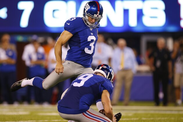 EAST RUTHERFORD, NJ - AUGUST 12: Kicker Josh Brown #3 of the New York Giants kicks a field goal as Brad Wing #9 holds against the Miami Dolphins during the first half of an NFL preseason game at MetLife Stadium on August 12, 2016 in East Rutherford, New Jersey. The Dolphins defeated the Giants 27-10. (Photo by Rich Schultz/Getty Images)